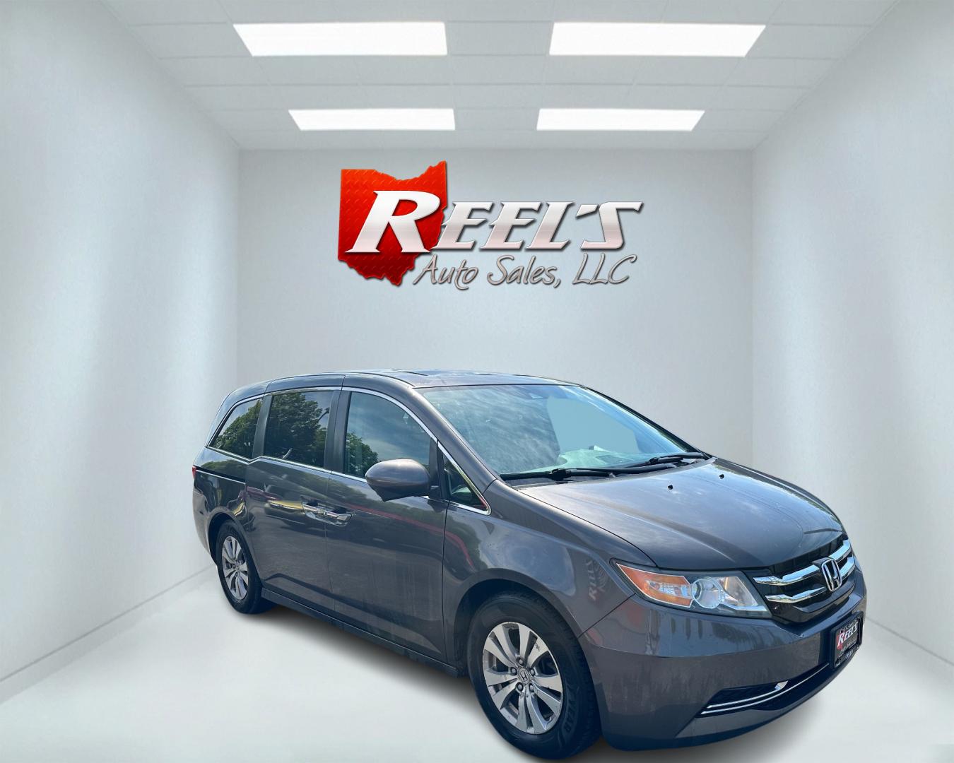 2015 Gray /Grey Honda Odyssey EX-L (5FNRL5H67FB) with an 3.5L V6 SOHC 24V engine, 6-Speed Automatic transmission, located at 547 E. Main St., Orwell, OH, 44076, (440) 437-5893, 41.535435, -80.847855 - Photo#2